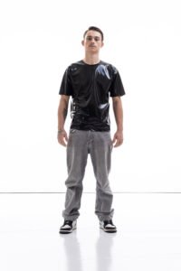 Metallic oversized latex shirt for men with relaxed fit, front view
