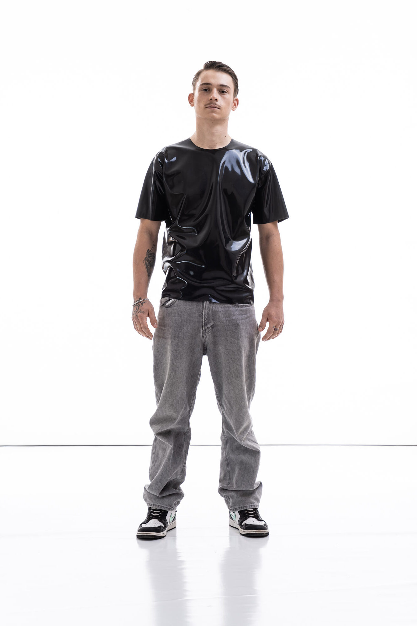 Metallic oversized latex shirt for men with relaxed fit, front view