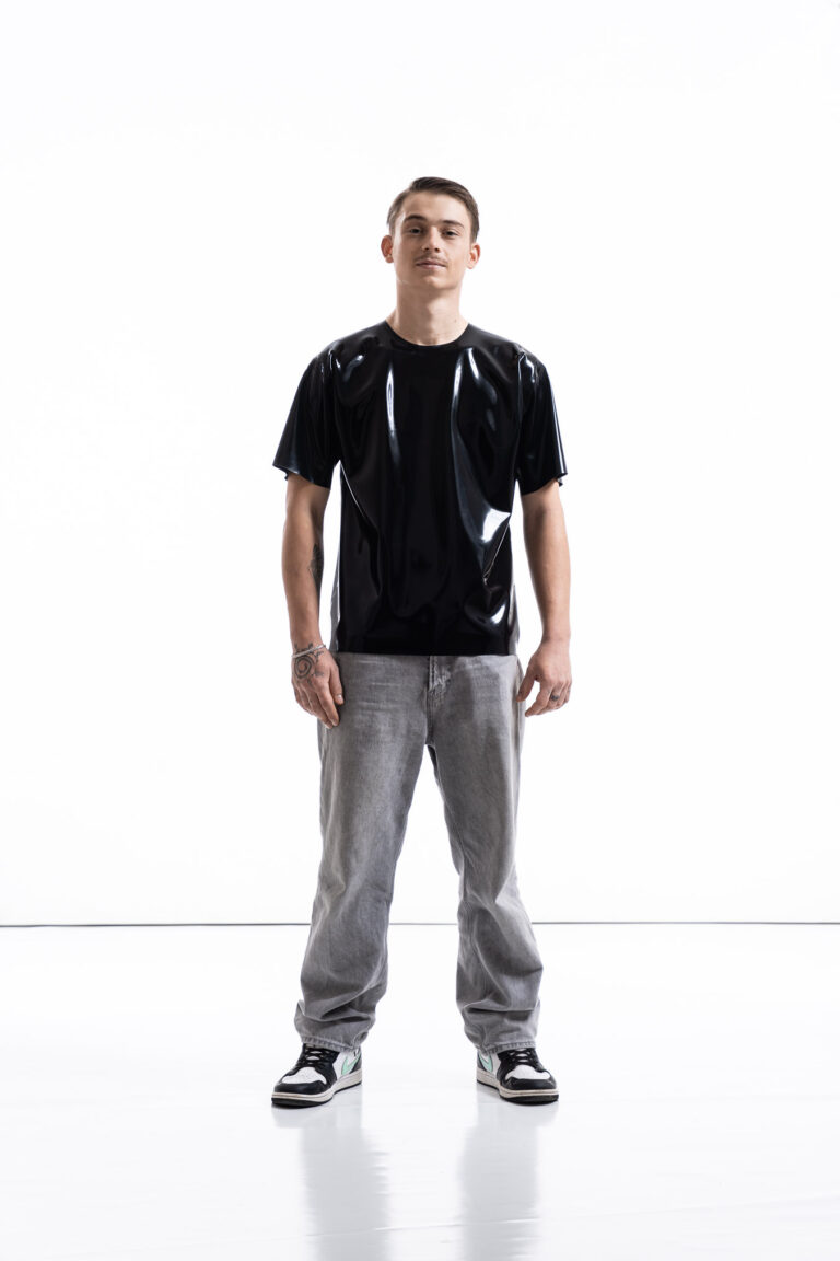 Black latex oversized shirt for men with relaxed silhouette, front view