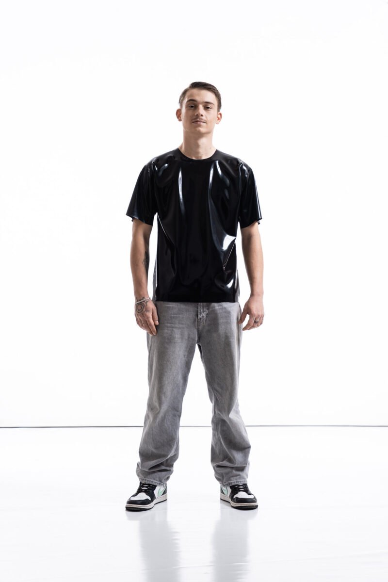 Black latex oversized shirt for men with relaxed silhouette, front view