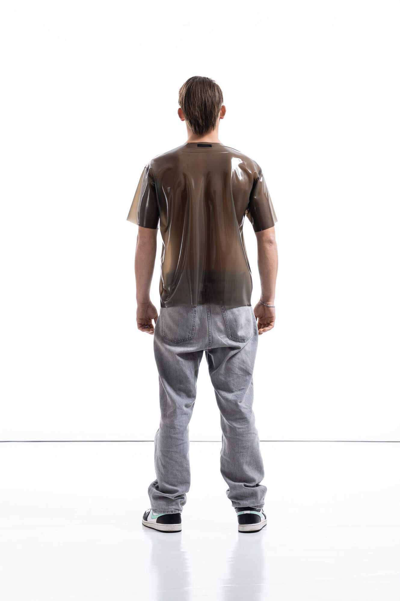 Smoky black latex oversized shirt for men with relaxed silhouette, back view