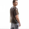 Smoky black latex oversized shirt for men with relaxed silhouette, side detail view