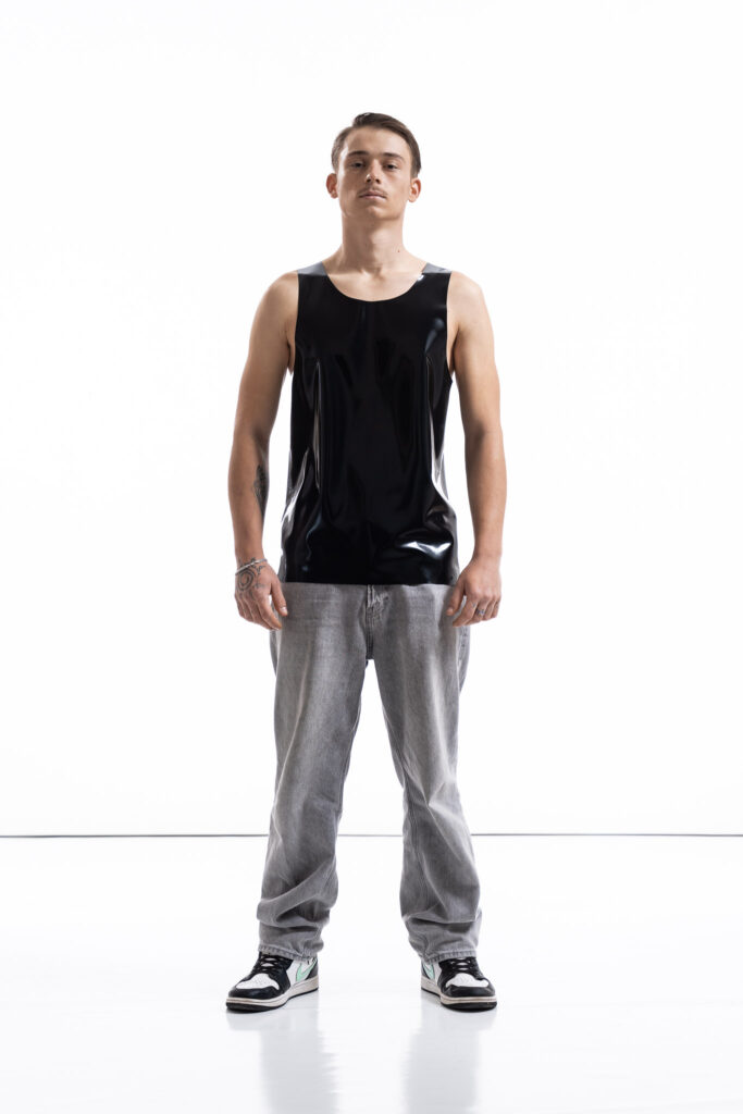 Black latex tank top for men with relaxed silhouette, front detail view