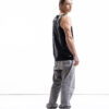 Black latex tank top for men with relaxed silhouette, side view