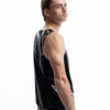 Black latex tank top for men with relaxed silhouette, side detail view