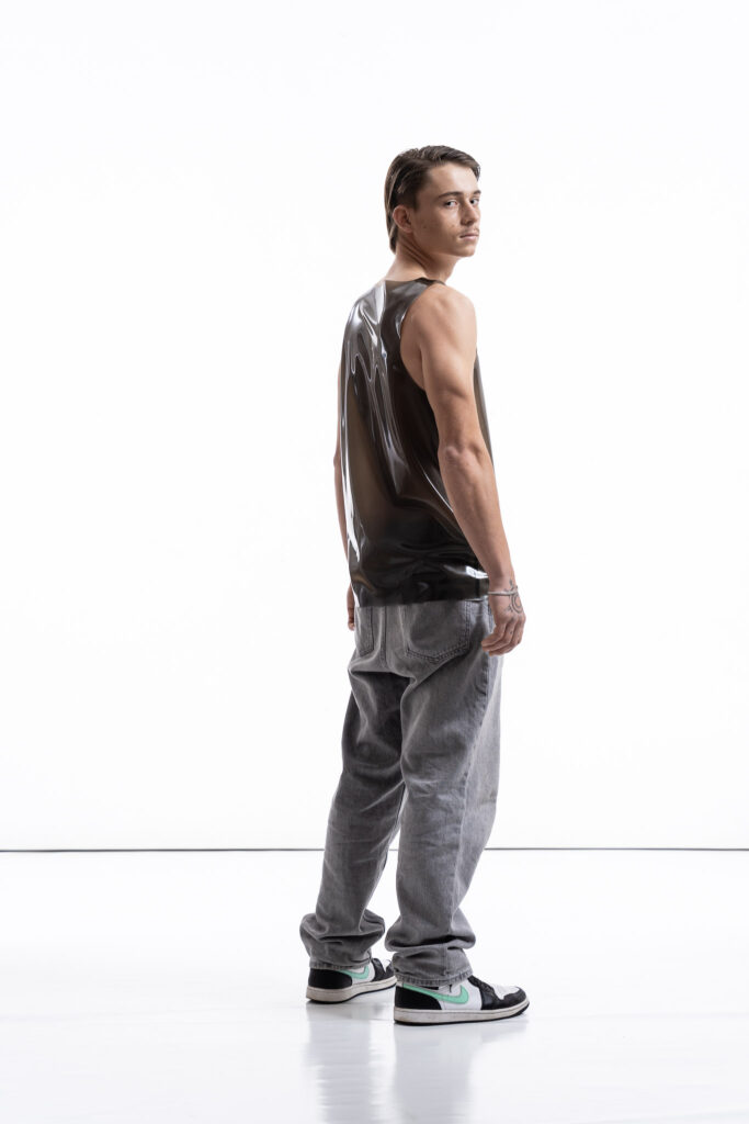 Smoky black latex tank top for men with clean fitted silhouette, side view